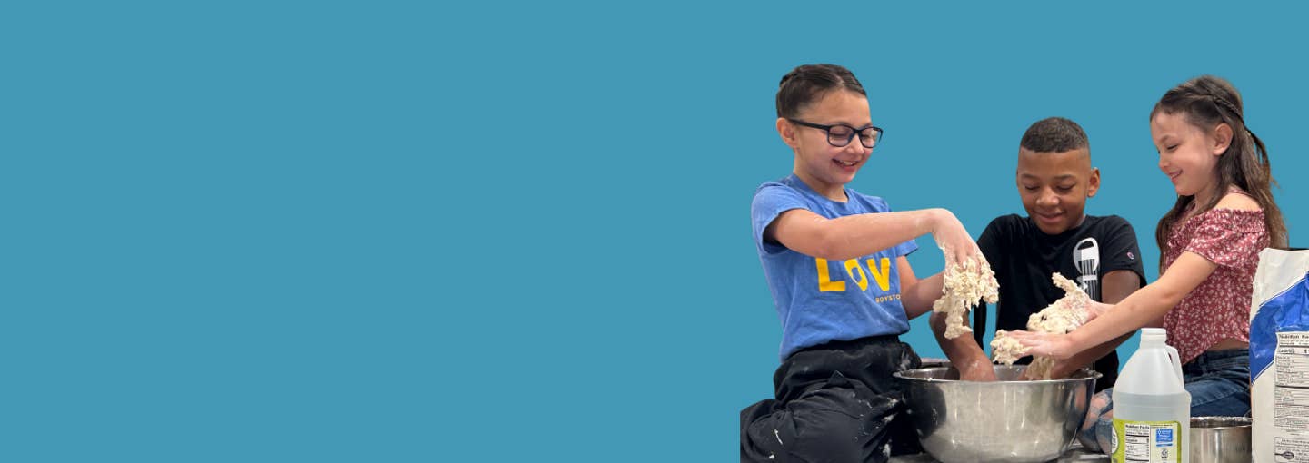 Young kids baking and laughing